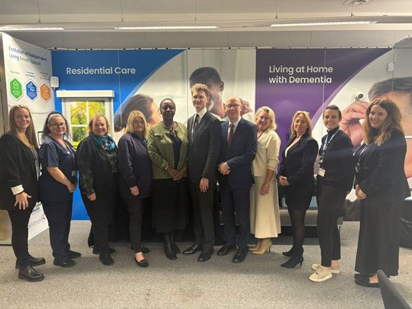 group photo of assisted living attendees