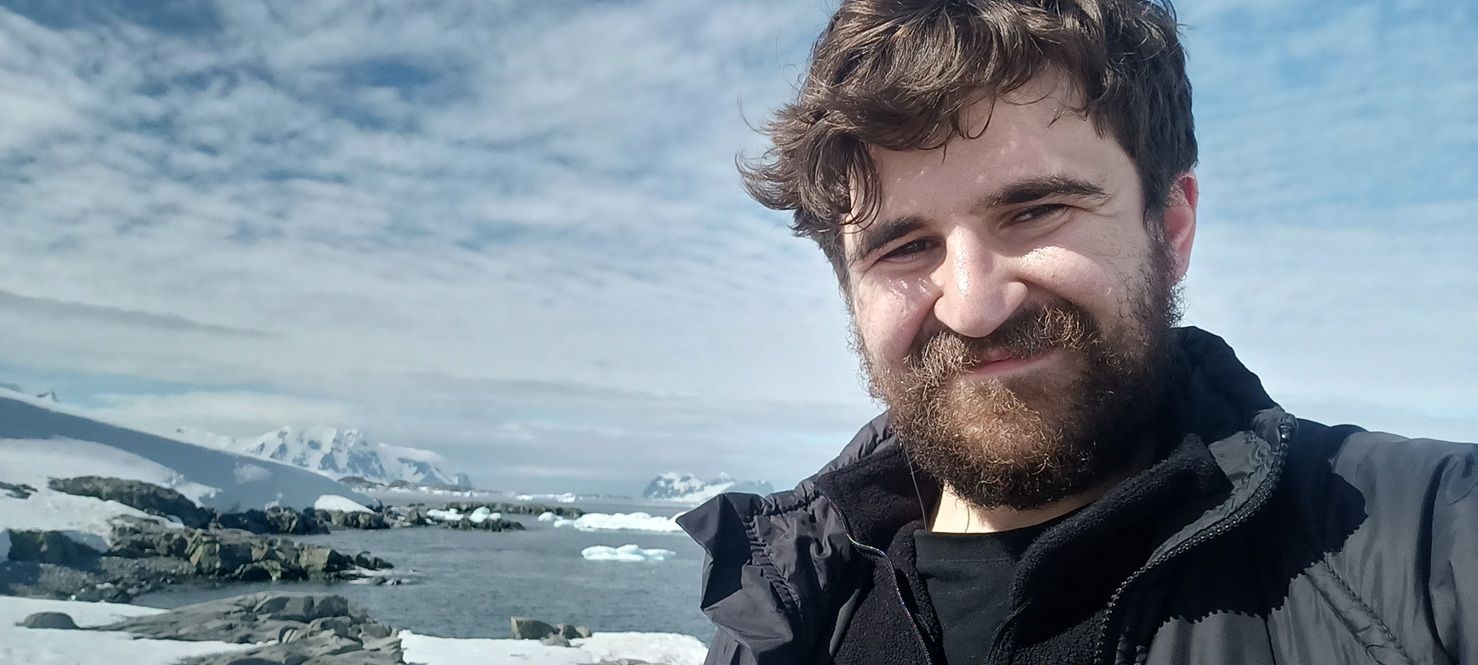 Man with Antarctic backdrop