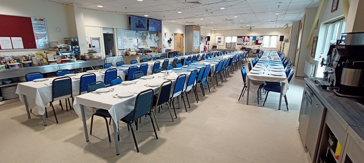 Dining hall with tables and chairs