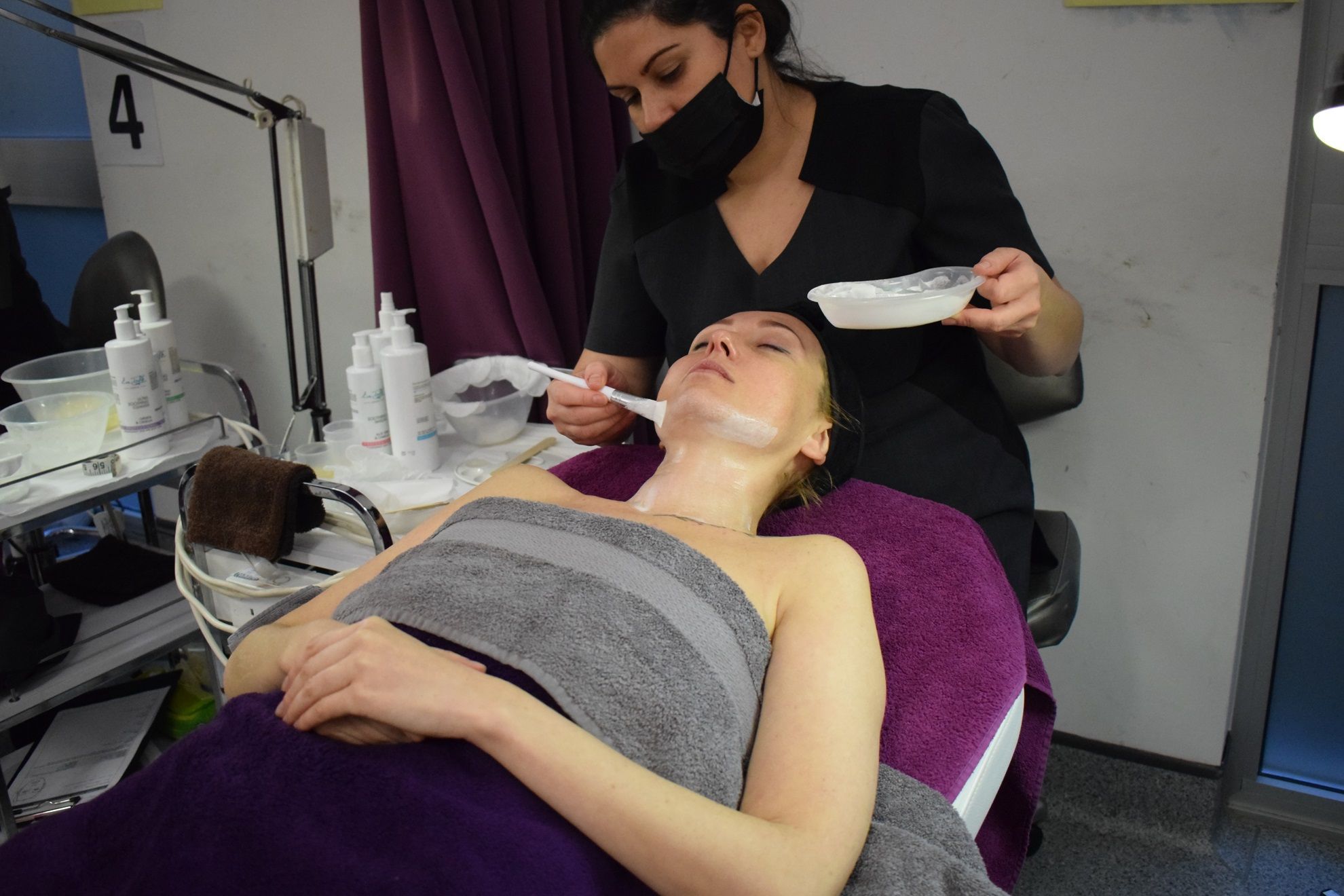 Student receiving spa treatment